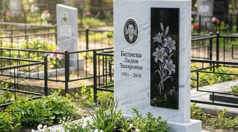 Памятник с гравировкой лилий — выполненная работа «Беляева» в Сочи