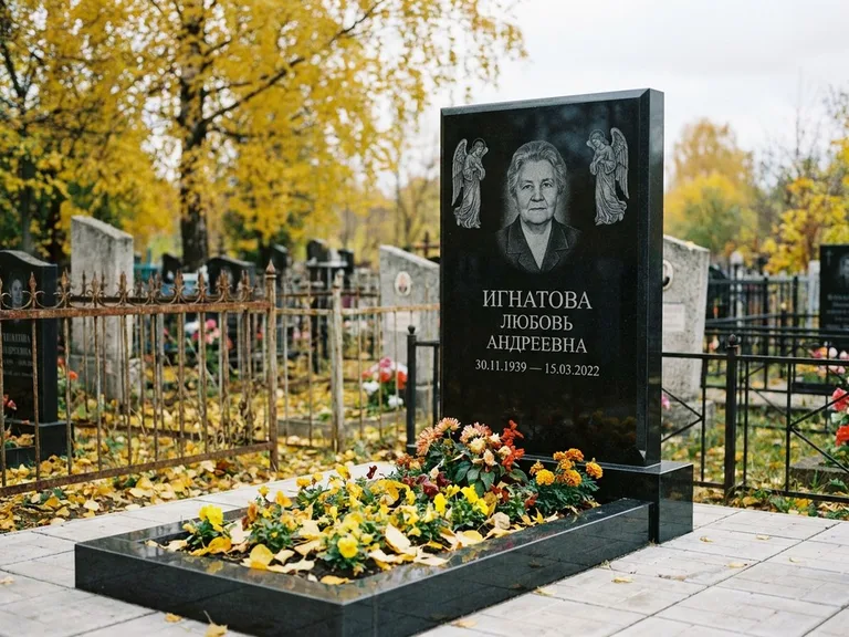 Памятник с гравировкой ангела — гравировка двух ангелов по сторонам портрета, работа «Игнатова» в Сочи