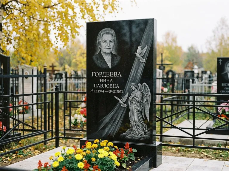 Памятник с гравировкой ангела — гравировка ангела с голубем по диагонали стелы, работа «Гордеева» в Сочи